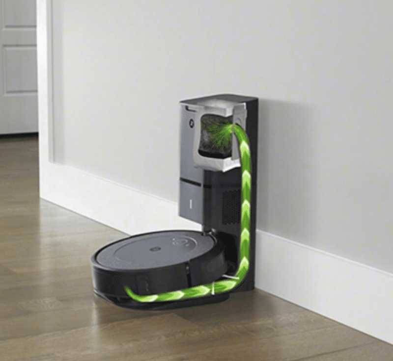 The self-emptying function of the i-series cleaning base is shown.